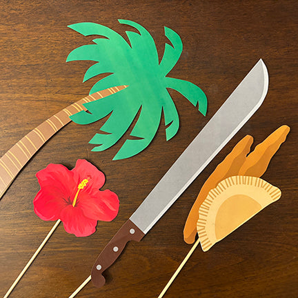 Illustrated Puerto Rican photo booth props featuring a palm tree, machete, pineapple, pastelillos (empanadas), a pot of arroz con gandules, a pilón with mofongo, a bunch of green plantains, a red hibiscus flower, a coquí frog on the Puerto Rican flag, and a green "Bienvenidos a Puerto Rico" welcome sign. These colorful icons represent the flavors and culture of Puerto Rico.