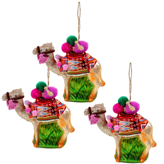 Colorful camel-shaped ornaments with decorative patterns on a white background