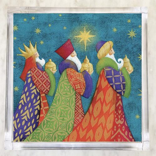Festive lunch napkin illustration of the Three Kings bearing gifts beneath the Star of Bethlehem, in bold patterned robes against a celestial blue background—ideal for Christmas dinners and Epiphany celebrations.