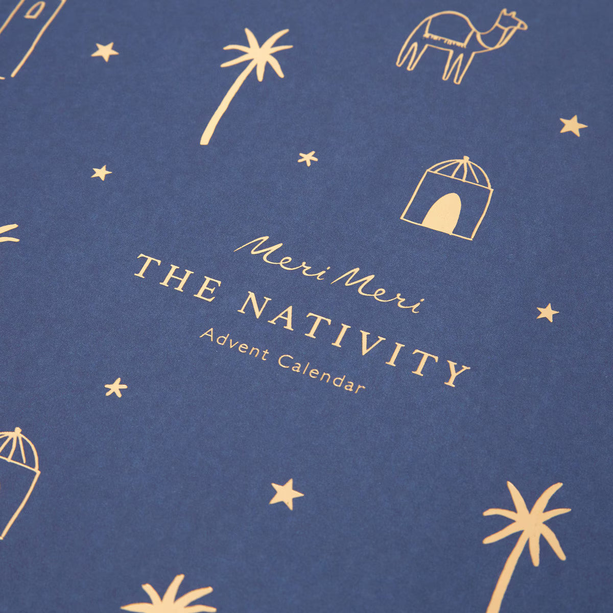 Meri Meri Nativity Advent Calendar with gold illustrations on a blue background