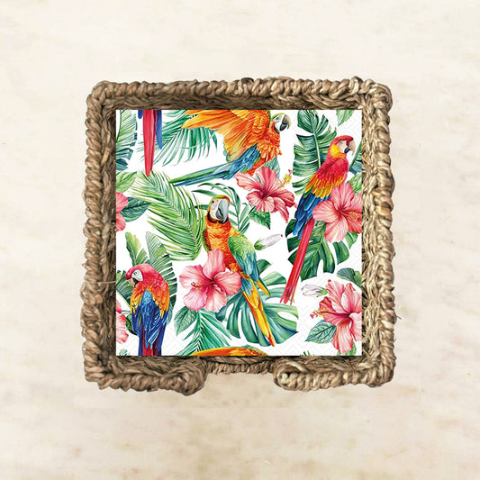 Tropical paper napkin with parrots, flowers, and leaves on a white background