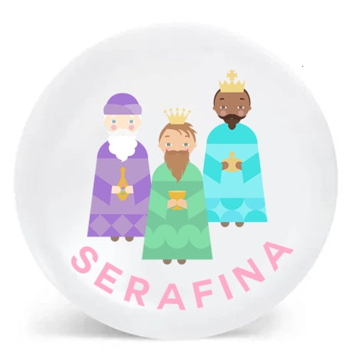 Round plate with illustrations of three wise men and the name 'Serafina' on a white background